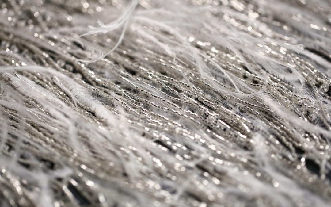 Bridal hand beaded design with beads, feathers and crystals by Ricamour